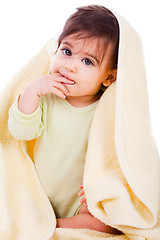 Image showing Innocent baby wrapped with a yellow towel