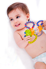Image showing Baby playing with toys
