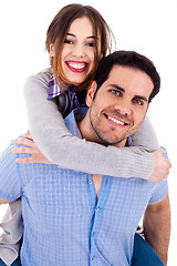 Image showing Man piggyback his girlfriend