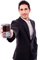 Image showing Business man showing a mobile phone