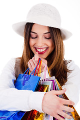 Image showing Closeup of women holding her shopping bags very happily