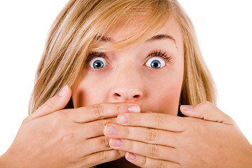 Image showing Closeup of young women covering her mouth with both hands
