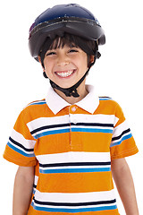 Image showing Kid with head cap ready for bicycle ride