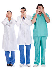 Image showing 3 doctors Don't see, don't speak and don't hear anything