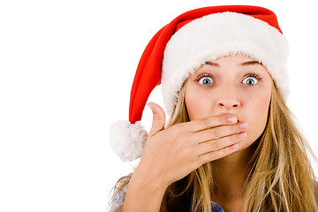 Image showing Closeup of young women covering her mouth with both hands