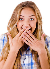 Image showing Closeup of young women covering her mouth with both hands