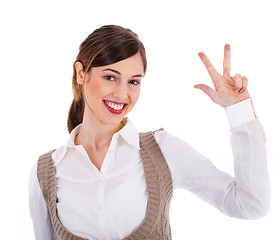 Image showing Beautiful young model raising her hand up and showing three fingers