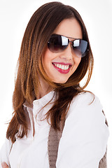 Image showing Young brunette model smiling with sunglasses