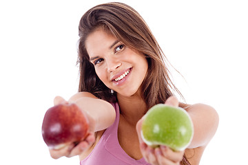 Image showing closeup of a girl giving apple in both hands