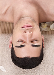 Image showing Caucasian handsome spa man ready to take massage