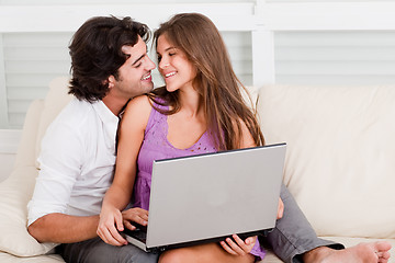 Image showing romantic young couple with laptop