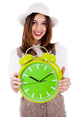 Image showing Beautiful young model with hat and showing clock