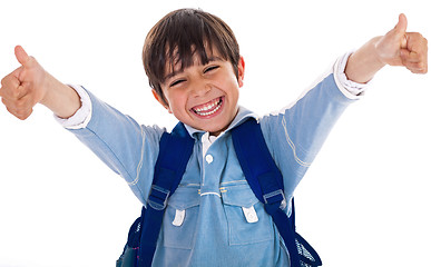 Image showing Cheerful school boy showing his thumbs up