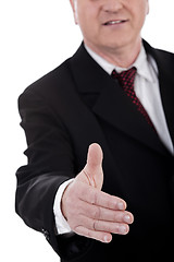 Image showing Business man gives shake hand