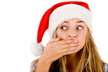 Image showing Closeup of young women covering her mouth with both hands