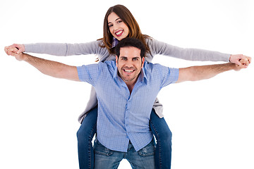 Image showing Front view of a couple in piggy back ride