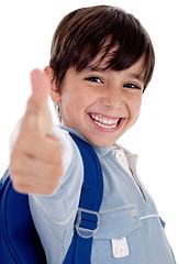 Image showing Smiling kinder garden boy gives thumbs up