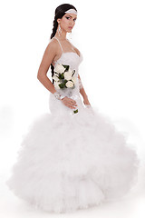 Image showing Isolated young trendy bride with bouquet