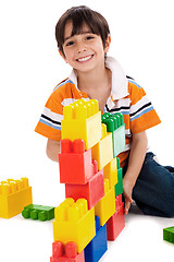 Image showing Young boy playing with building blocks