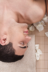 Image showing Man relaxing in spa salon