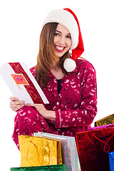 Image showing Santa girl holding a christmas card