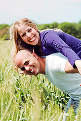 Image showing Embracing lovely lovers having fun