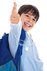 Image showing Smiling kinder garden boy gives thumbs up