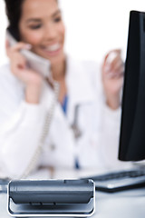 Image showing Telephone of focus, doctor talking with it