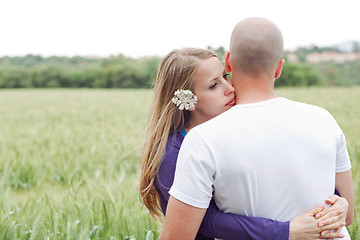 Image showing Loving couple standing in the field