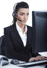 Image showing Beautiful business woman with headset