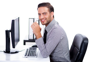 Image showing Business man smiling at you in the office