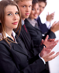 Image showing Group of business people clapping