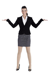 Image showing Beautiful business woman streching both the hands and pointing empty space