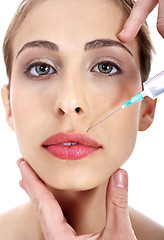 Image showing Close up face of a young young face being injected on face