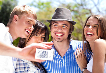 Image showing group of happy smiling couples taking picture together