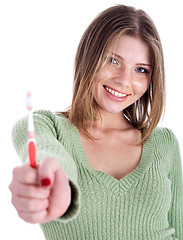 Image showing Beautiful woman holding tooth brush