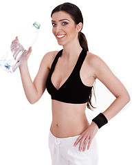 Image showing fitness women smiling with water bottle