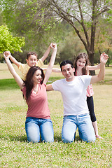 Image showing Full length of Happy family enjoying their holidays