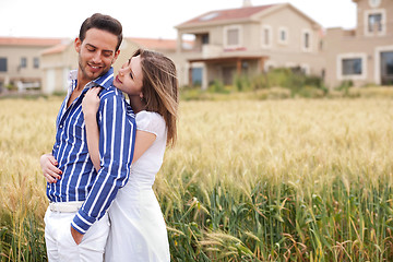 Image showing Loving couple, woman hugging her boyfriend