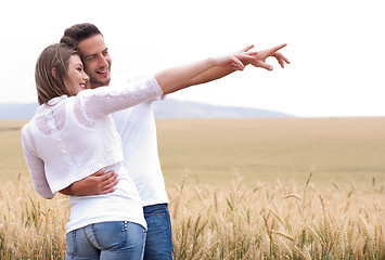 Image showing Young couple in meadow