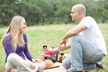 Image showing Men make wedding proposal