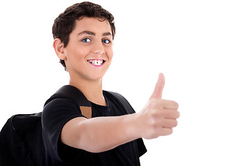 Image showing Side pose of teenager shows thumbs up