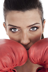 Image showing young attractive woman wearing red gloves