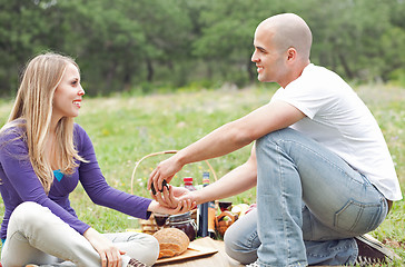 Image showing Men make wedding proposal