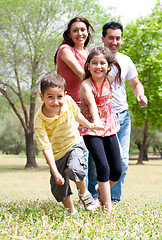 Image showing Happy family having fun in the park