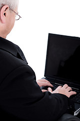 Image showing Rear view of business man working in laptop