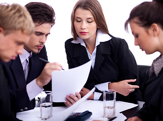 Image showing Young business professionals discussing seriously