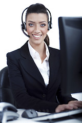 Image showing Receptionist at work with headset