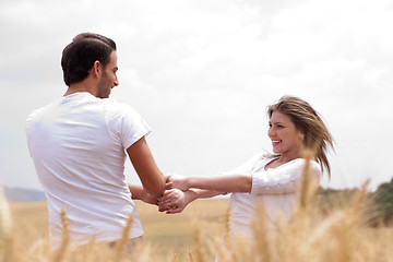 Image showing Loving handsome couple playing