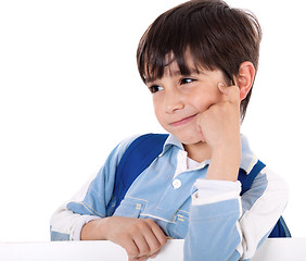 Image showing Portrait of a adorable school boy thinking